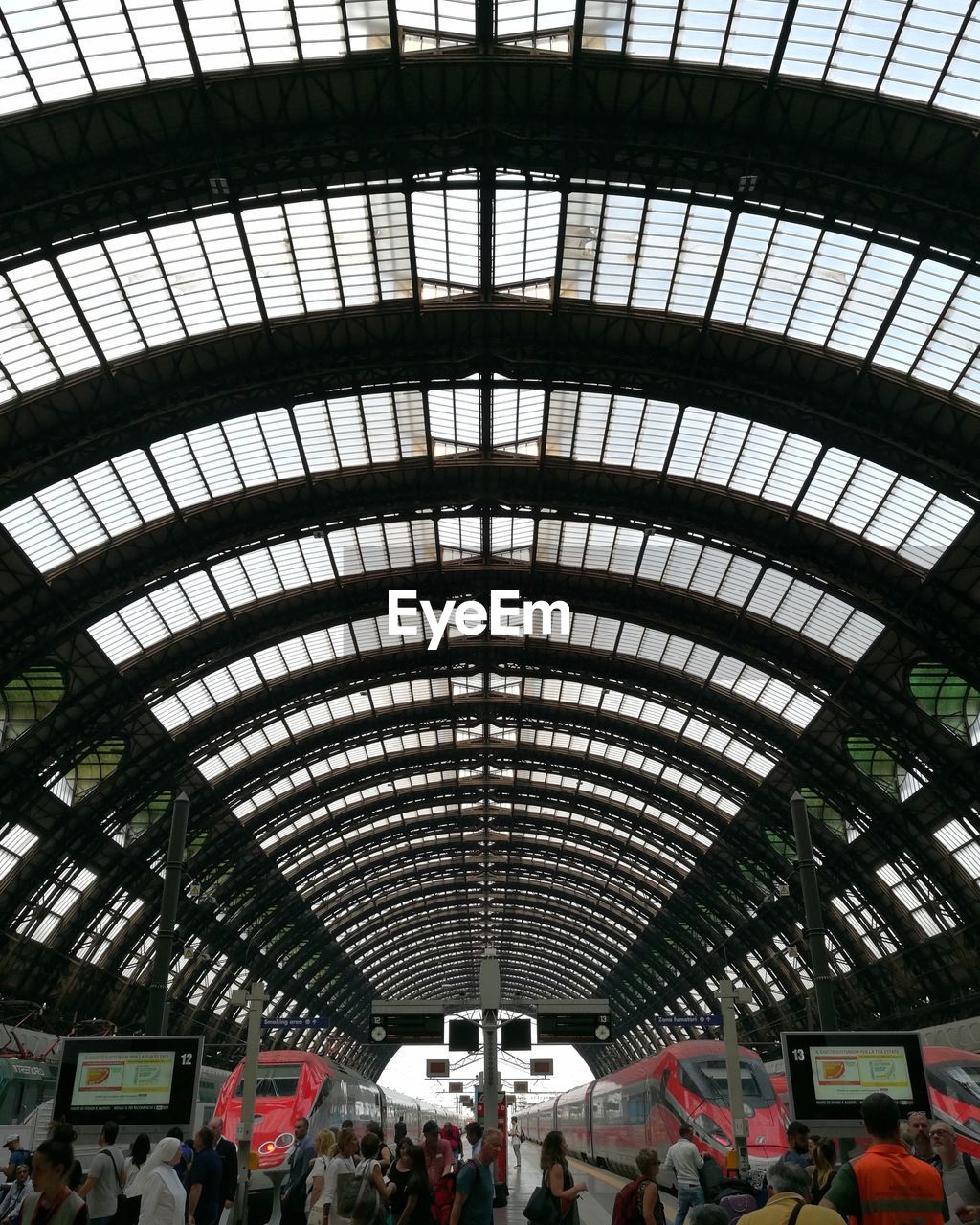 People at railroad station platform