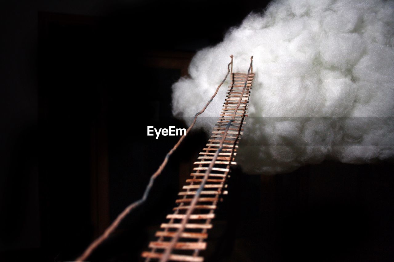 Rope bridge leading to cotton cloud