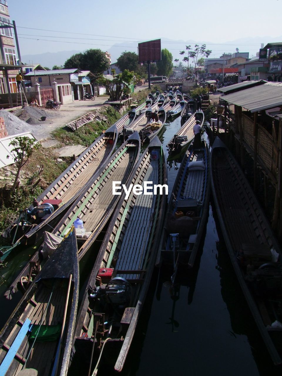 HIGH ANGLE VIEW OF RAILROAD TRACKS IN CITY