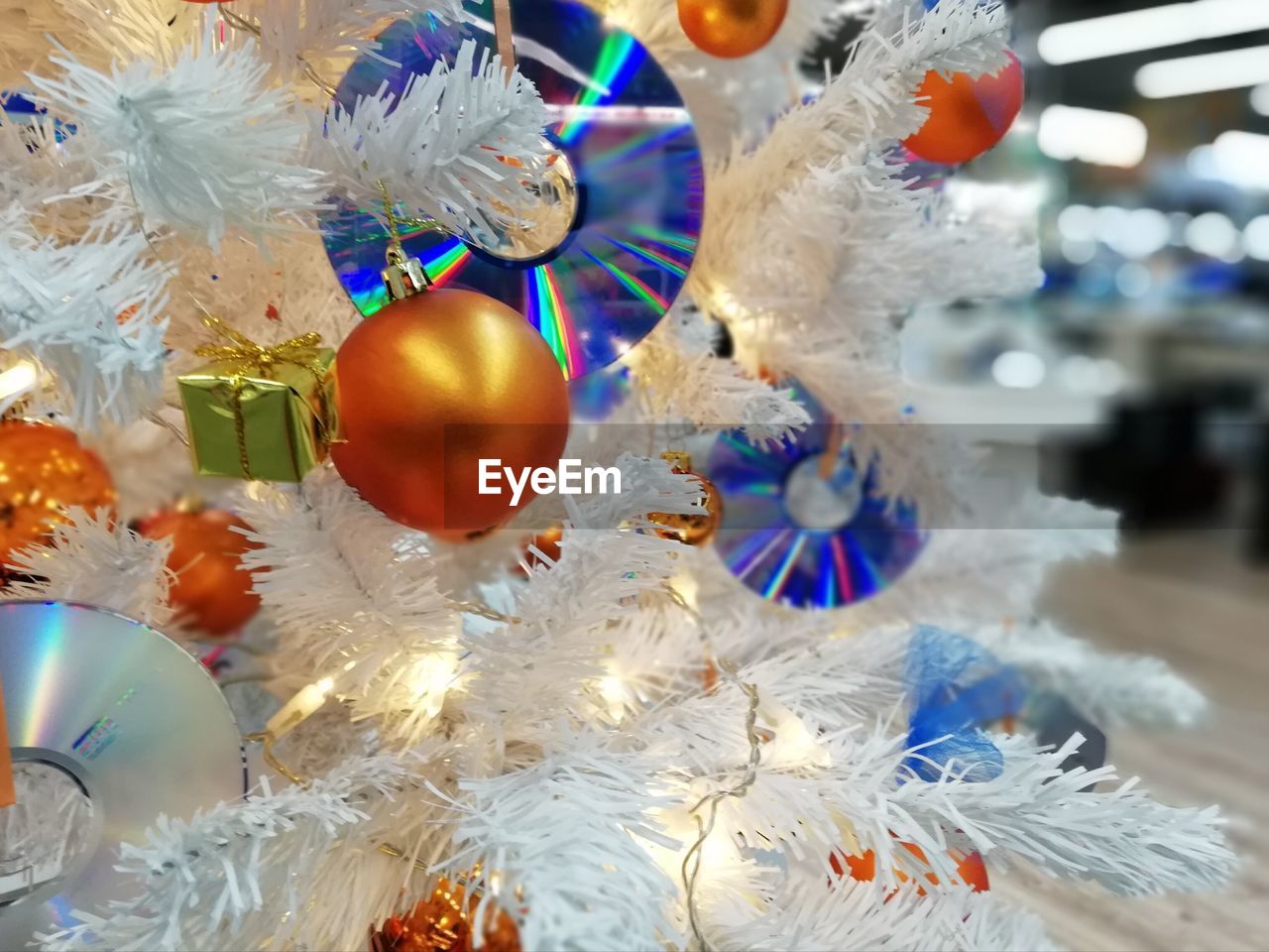 CLOSE-UP OF CHRISTMAS DECORATIONS HANGING ON TREE