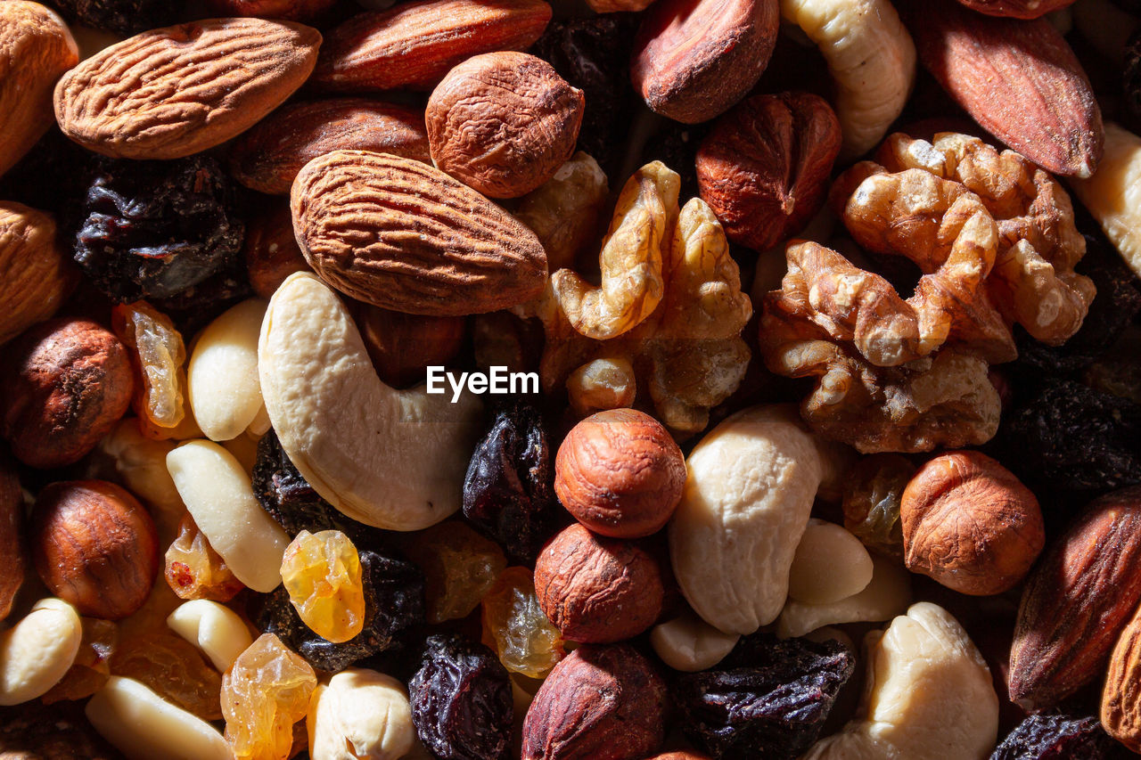 food and drink, food, nut, nut - food, large group of objects, produce, healthy eating, abundance, wellbeing, full frame, freshness, almond, still life, no people, backgrounds, nuts & seeds, close-up, dried fruit, indoors, brown, variation, dried food, fruit, hazelnut, high angle view, walnut, directly above