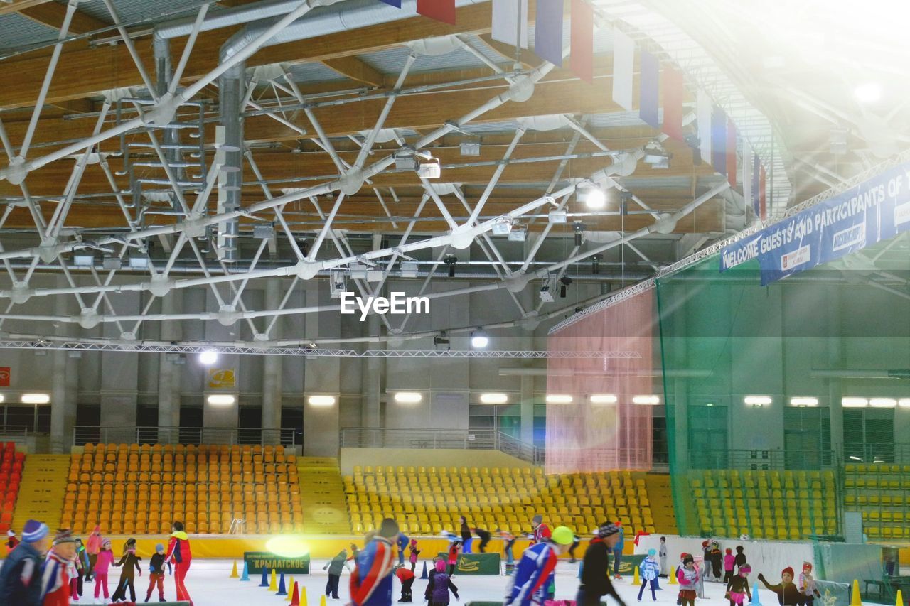 arena, sport venue, crowd, group of people, large group of people, stadium, sports, architecture, indoors, men, built structure, adult, ice rink, soccer-specific stadium