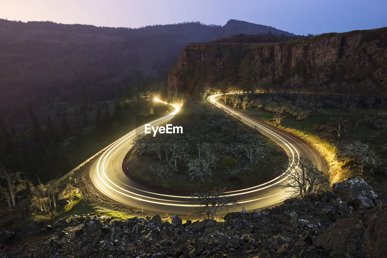 High angle view of light trails on road at columbia river gorge