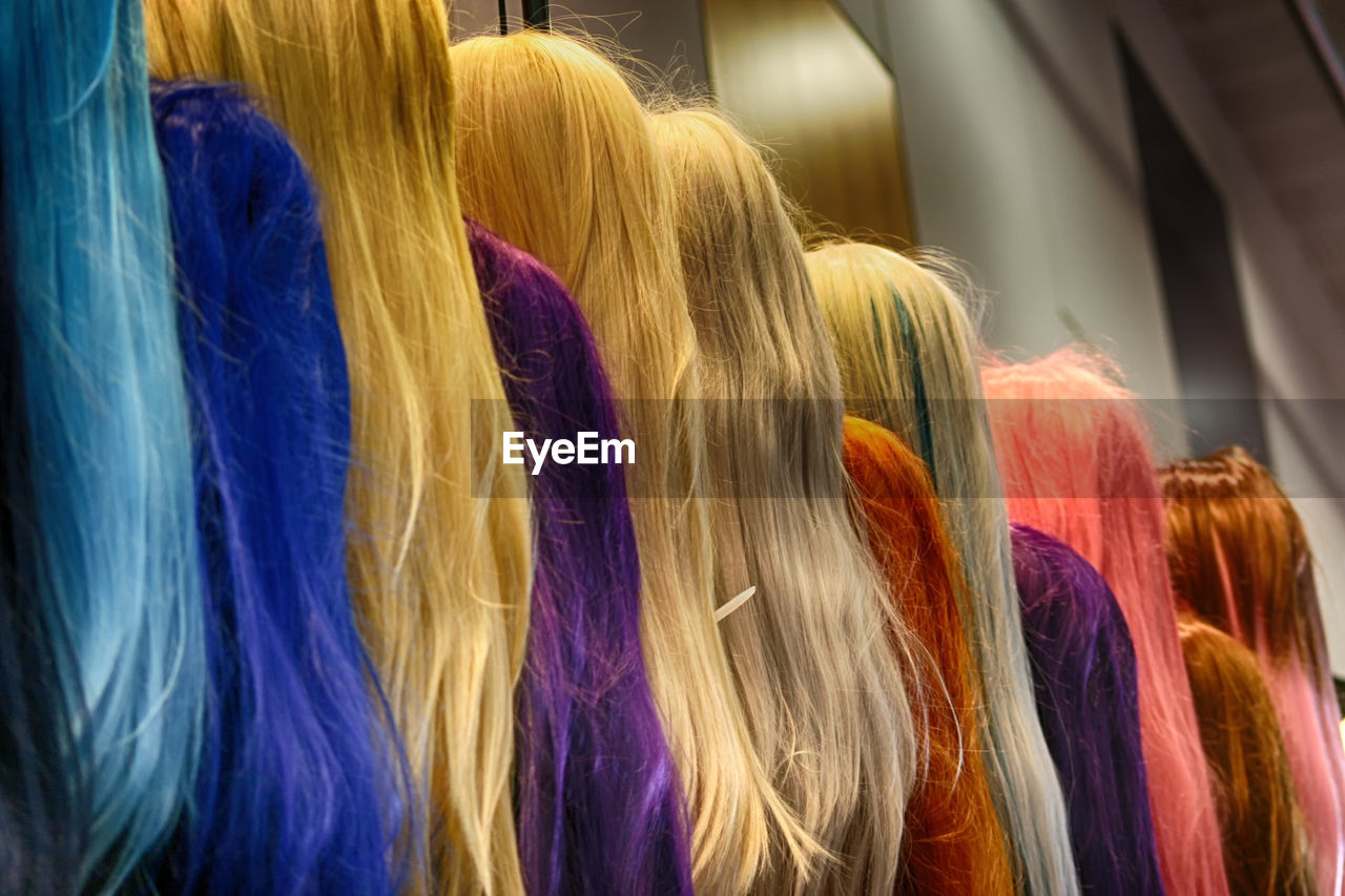 Colorful wigs at store for sale