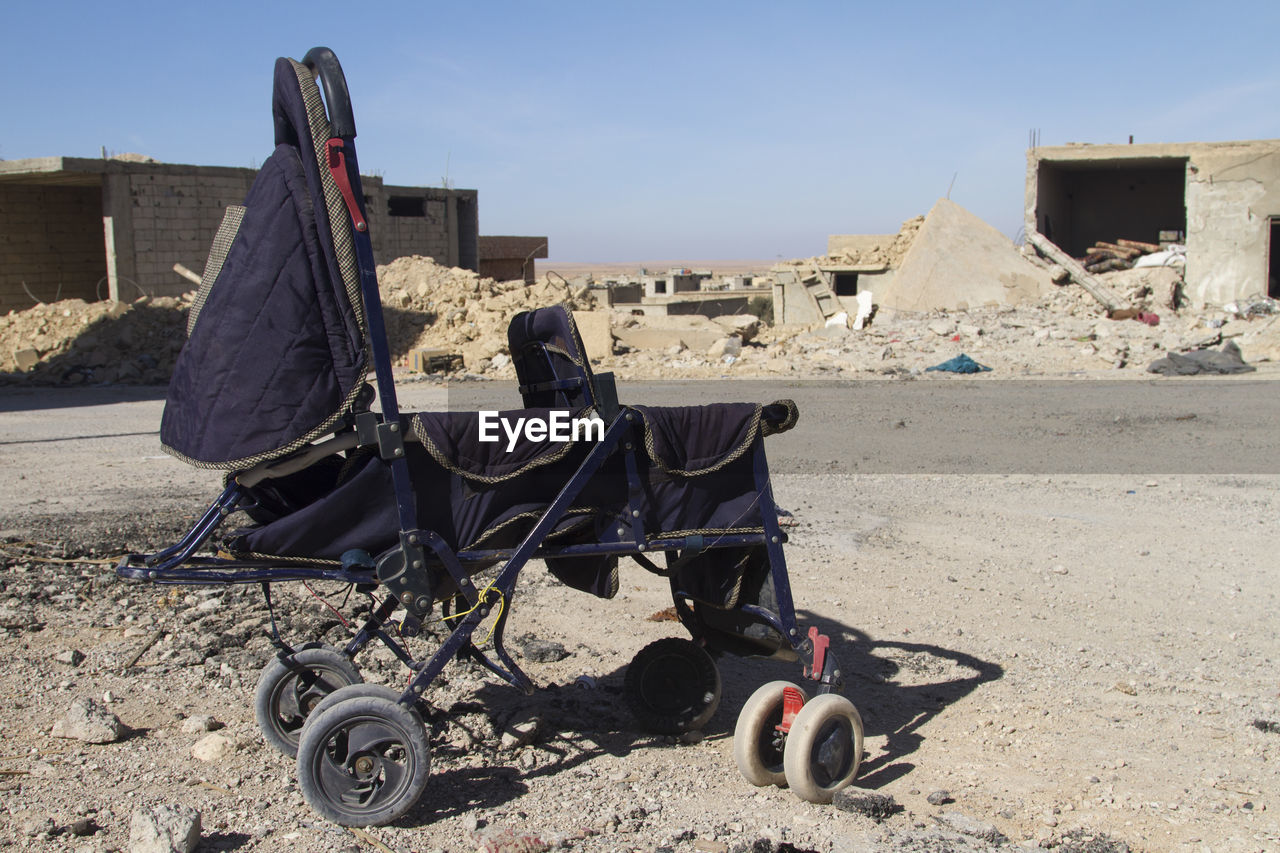 Deserted baby stroller in syria