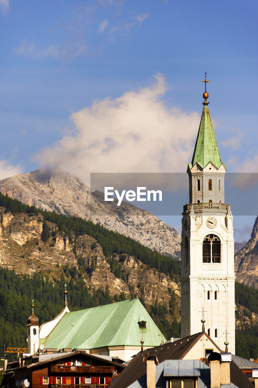 Church at cortina d ampezzo against sky