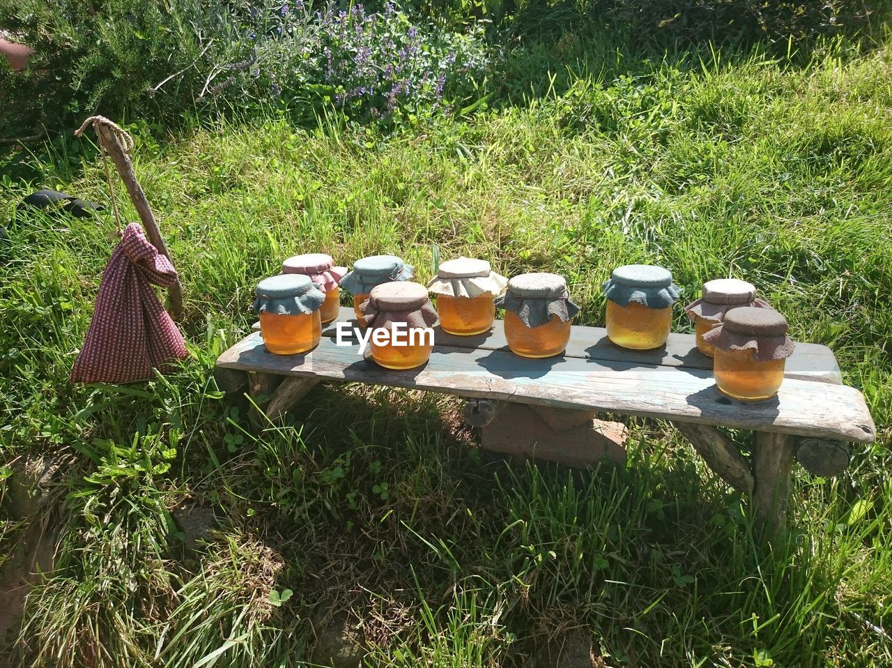 HIGH ANGLE VIEW OF MULTI COLORED WINE GLASSES ON TABLE