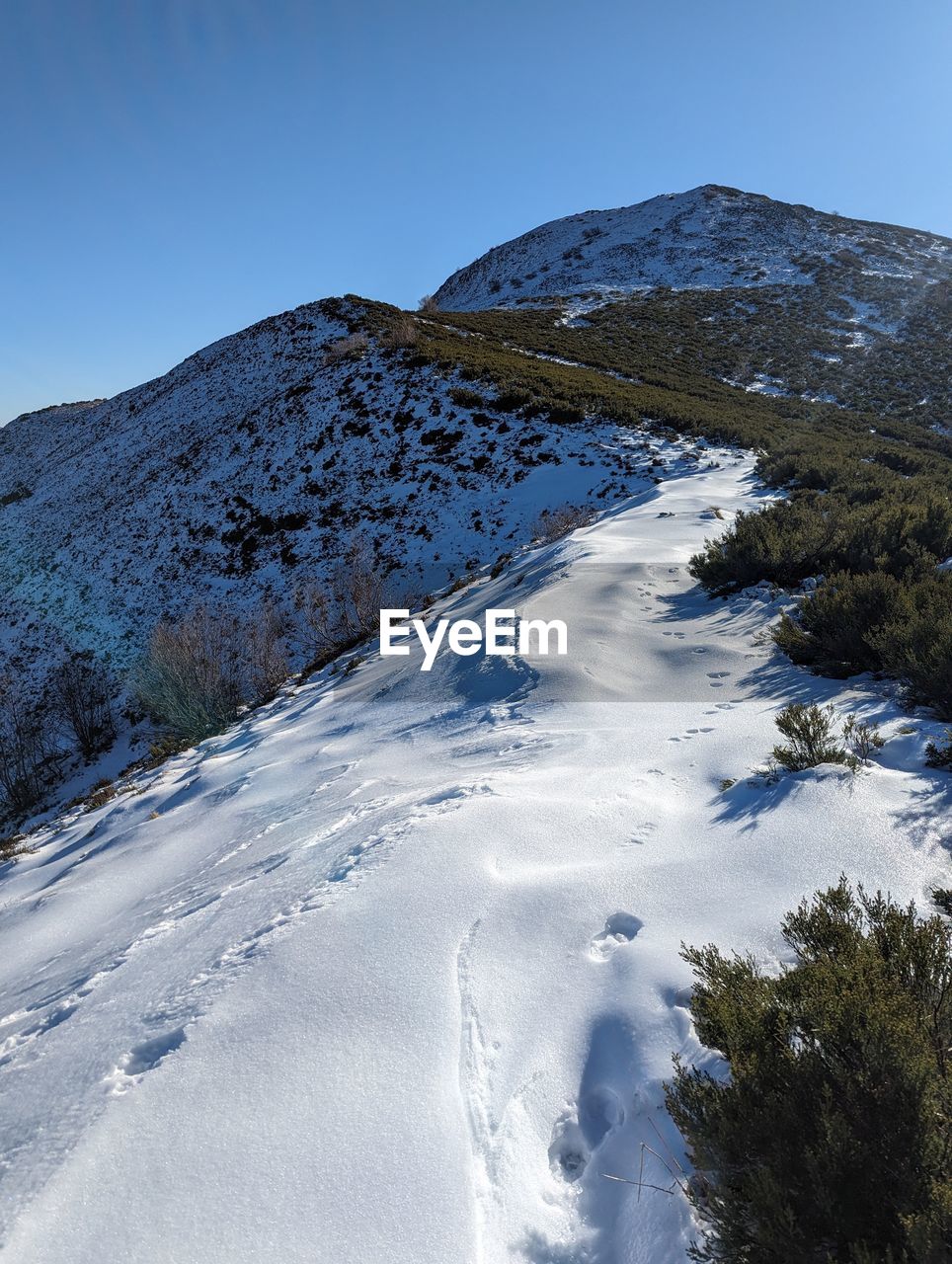 scenic view of snow covered mountain against sky