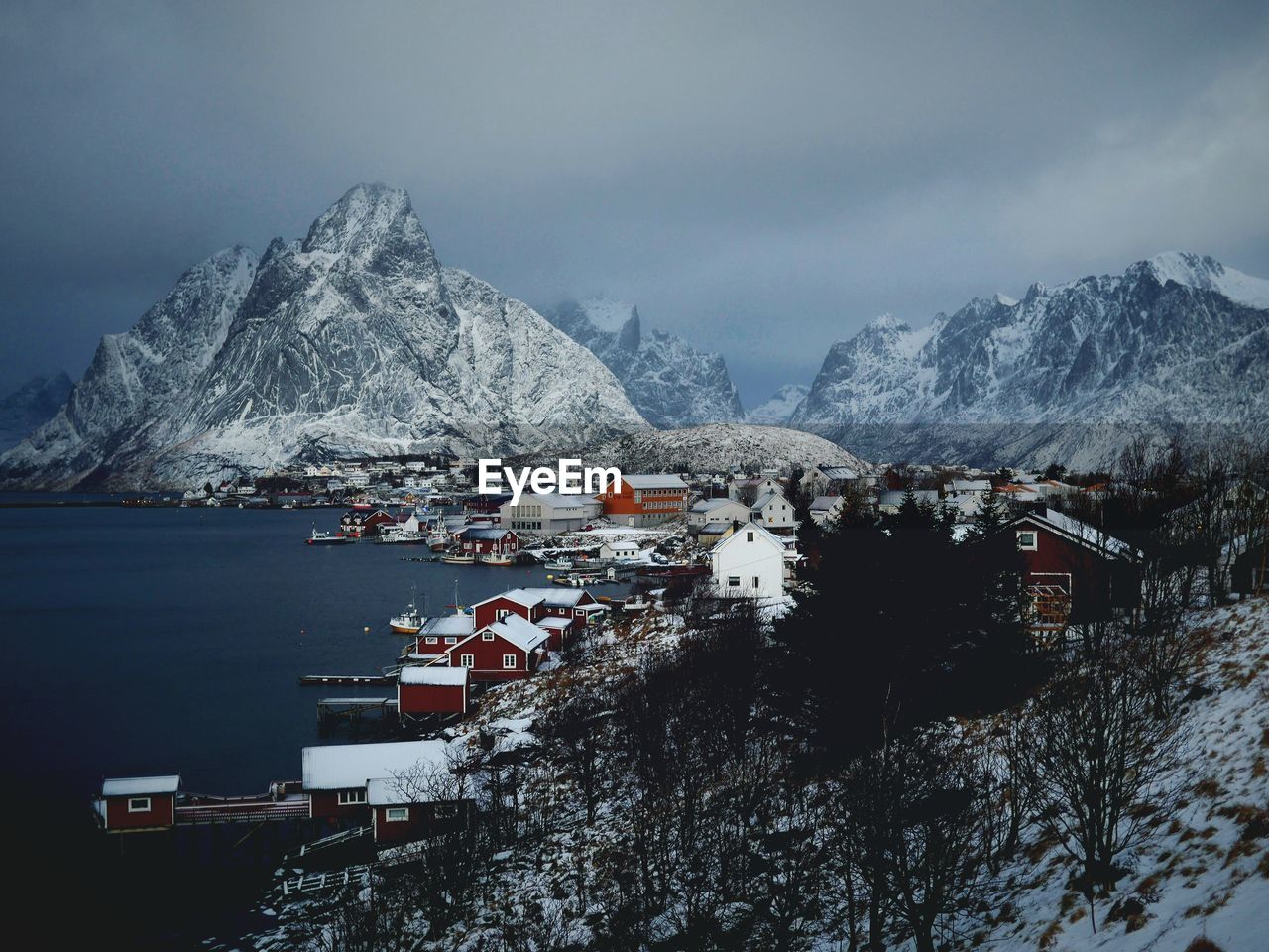 Scenic view of snowcapped mountains against sky during winter