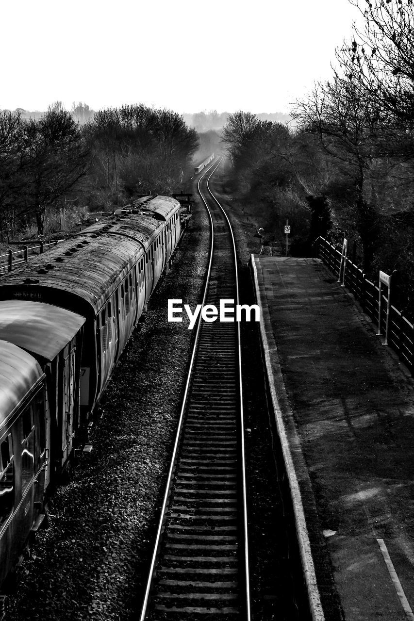 RAILWAY TRACKS AGAINST SKY