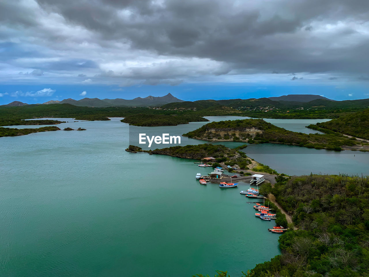 water, cloud, environment, sky, landscape, scenics - nature, land, nature, sea, travel, travel destinations, beauty in nature, coast, mountain, body of water, beach, nautical vessel, tourism, tranquility, no people, coastline, outdoors, reflection, transportation, architecture, shore, trip, vacation, bay, holiday, island, tranquil scene, lagoon, reservoir, plant, high angle view, dramatic sky, aerial view, summer, cloudscape, overcast, city, building, social issues, day, forest, environmental conservation, tree, blue, idyllic, bay of water