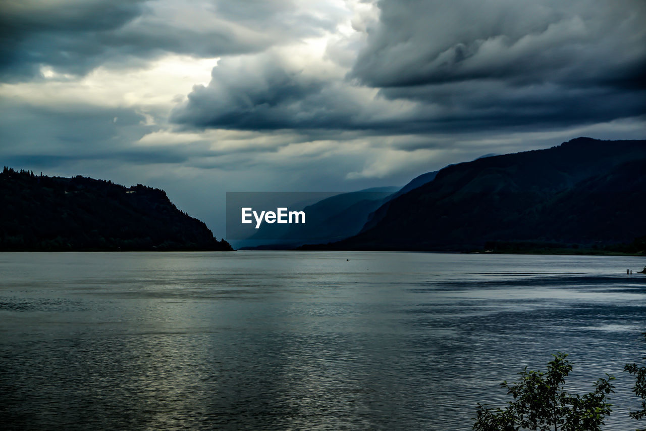 Lake with mountains in background