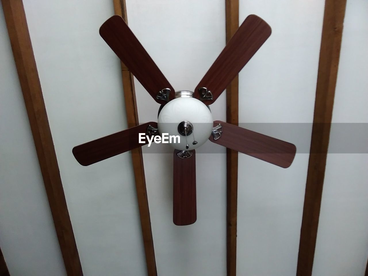 Low angle view of ceiling fan