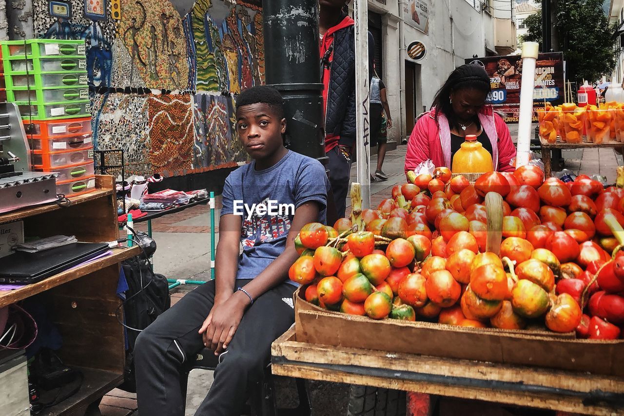 FULL LENGTH OF MAN IN MARKET