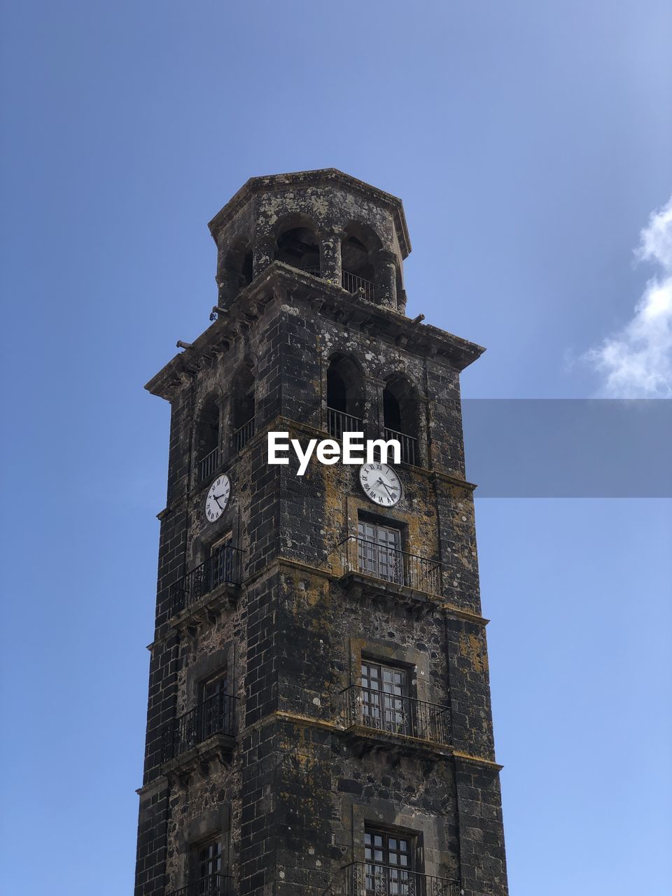 low angle view of building against clear blue sky