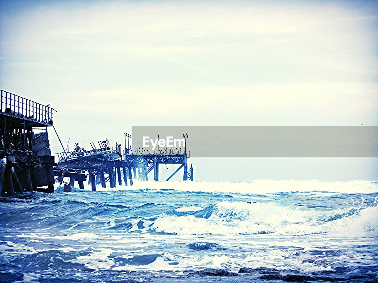 Broken pier at sea