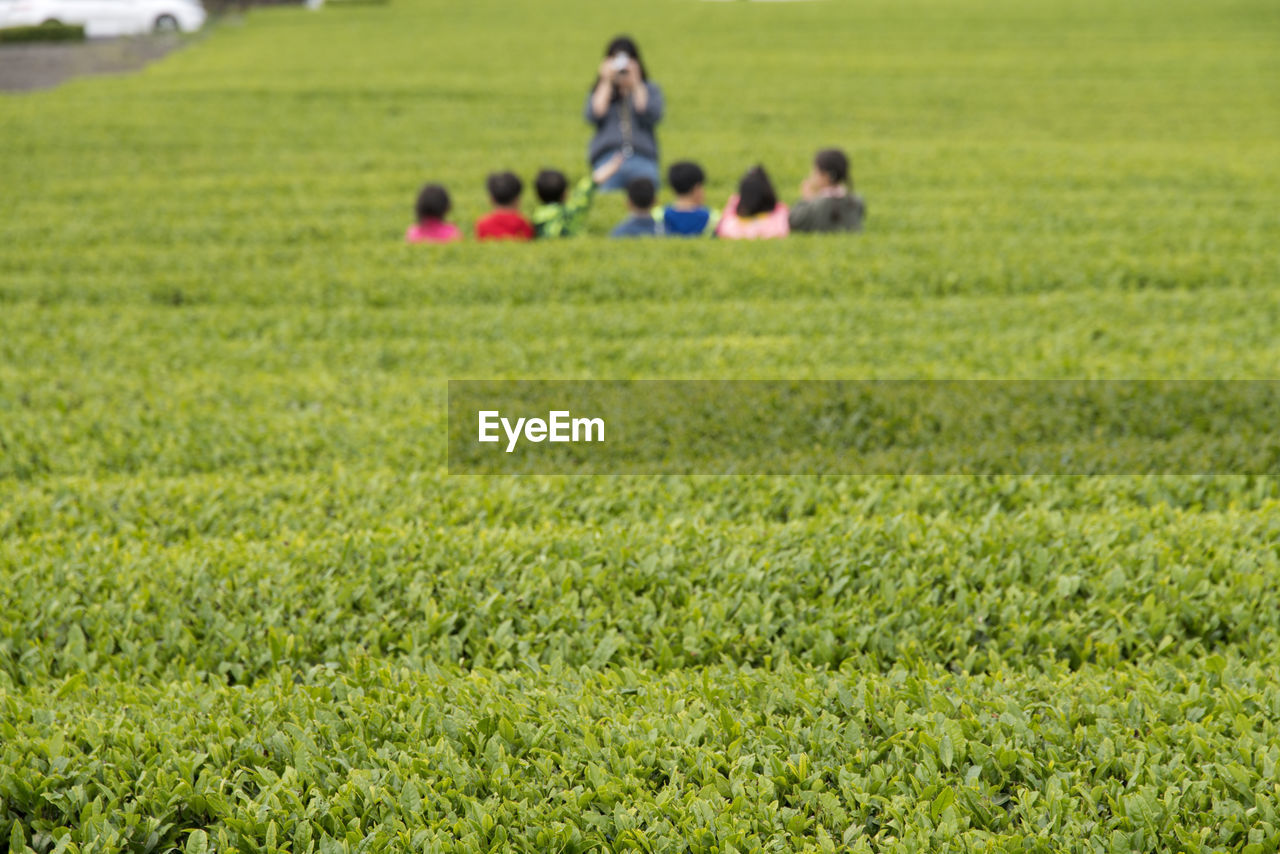 Woman with children during field trip