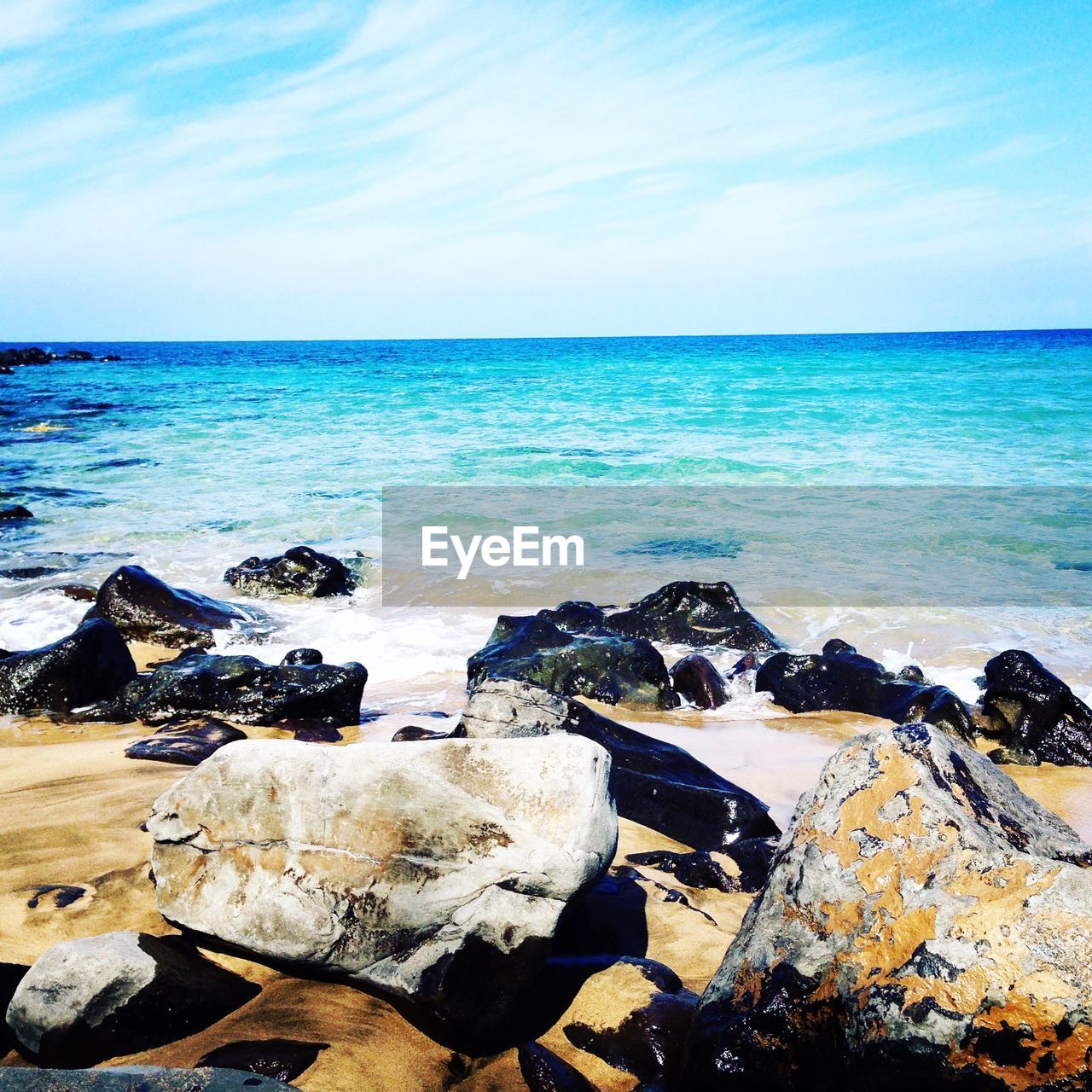 SCENIC VIEW OF SEA AGAINST BLUE SKY