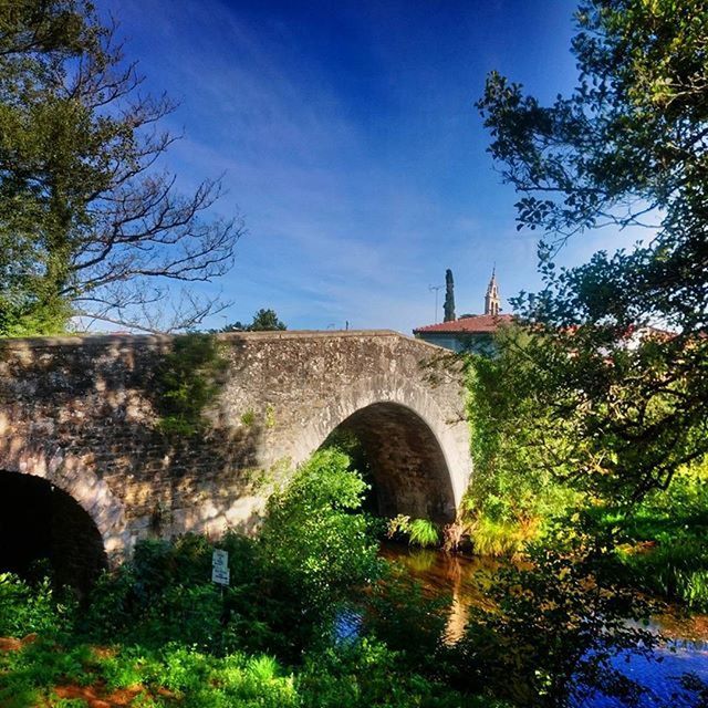 BRIDGE OVER RIVER WITH BRIDGE IN BACKGROUND