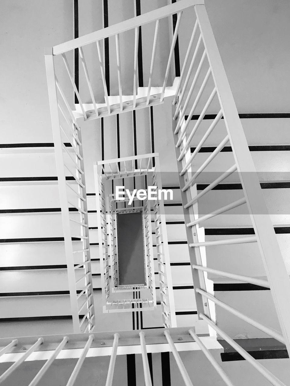 Low angle view of spiral staircase in building