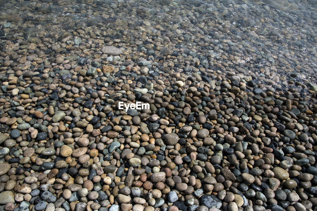 High angle view of waves on beach