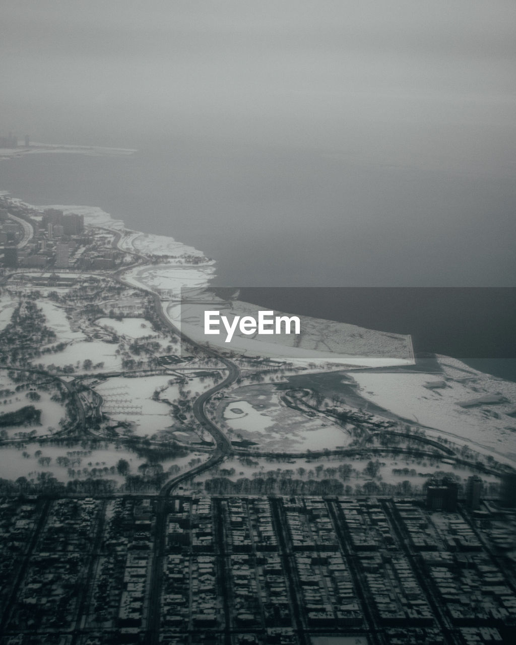 AERIAL VIEW OF CITY AGAINST SKY