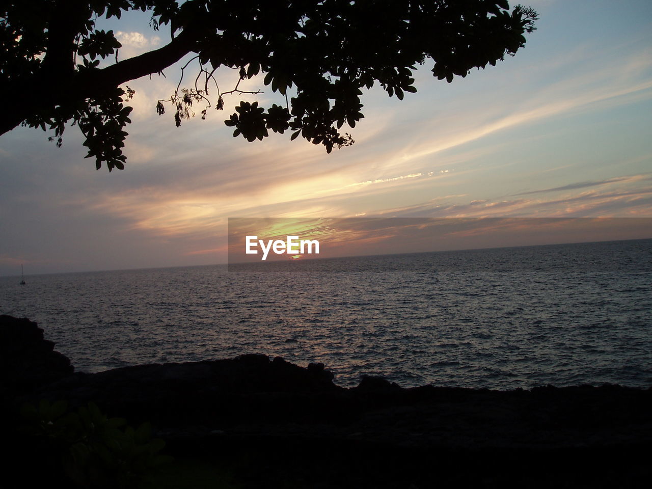 SCENIC VIEW OF SEA DURING SUNSET