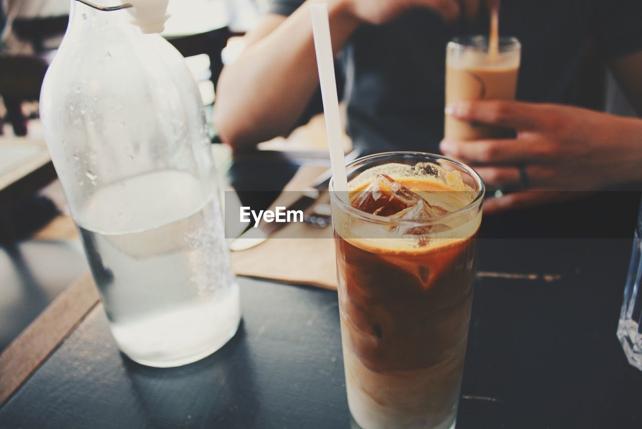 Iced coffee on cafe table