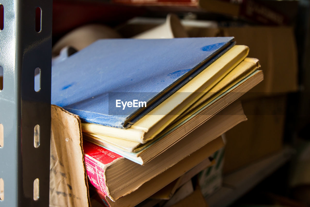 Close-up of book in shelf