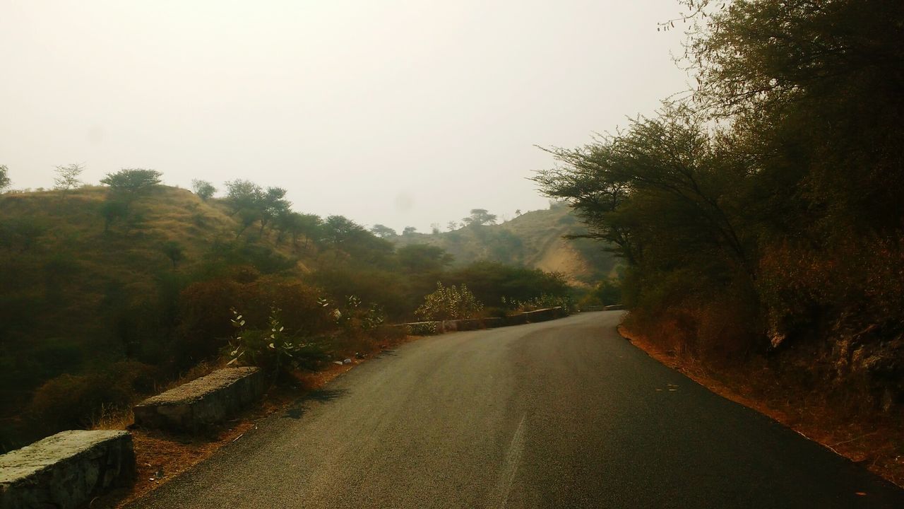 ROAD AGAINST CLEAR SKY