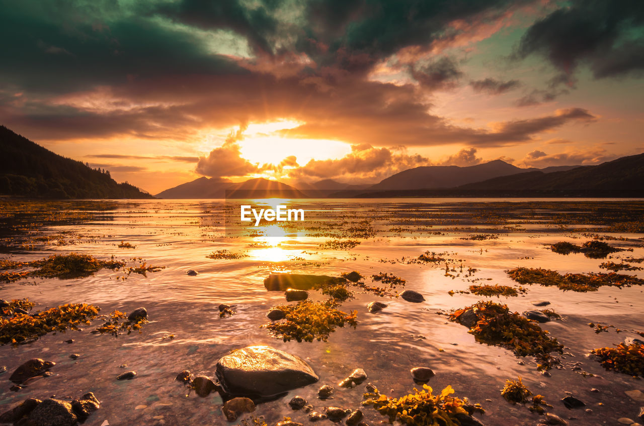 Sunset on a lake in the scottish highlands