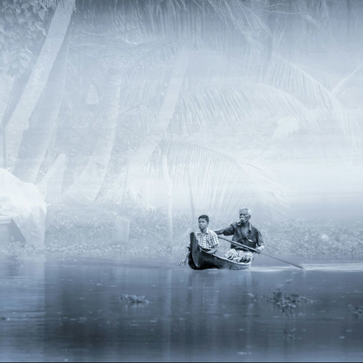 REFLECTION OF WOMAN IN WATER