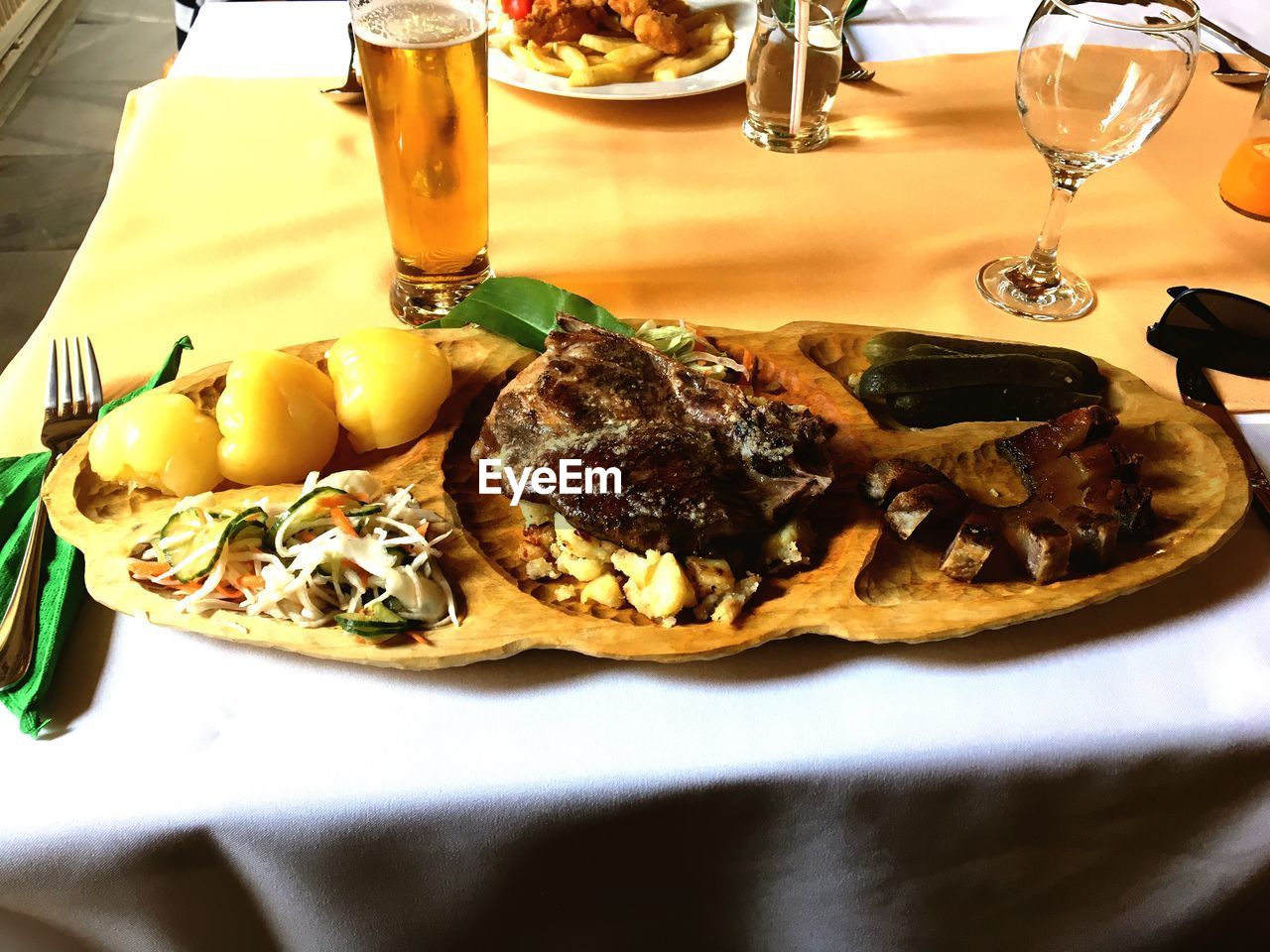 CLOSE-UP OF SERVED FOOD ON TABLE