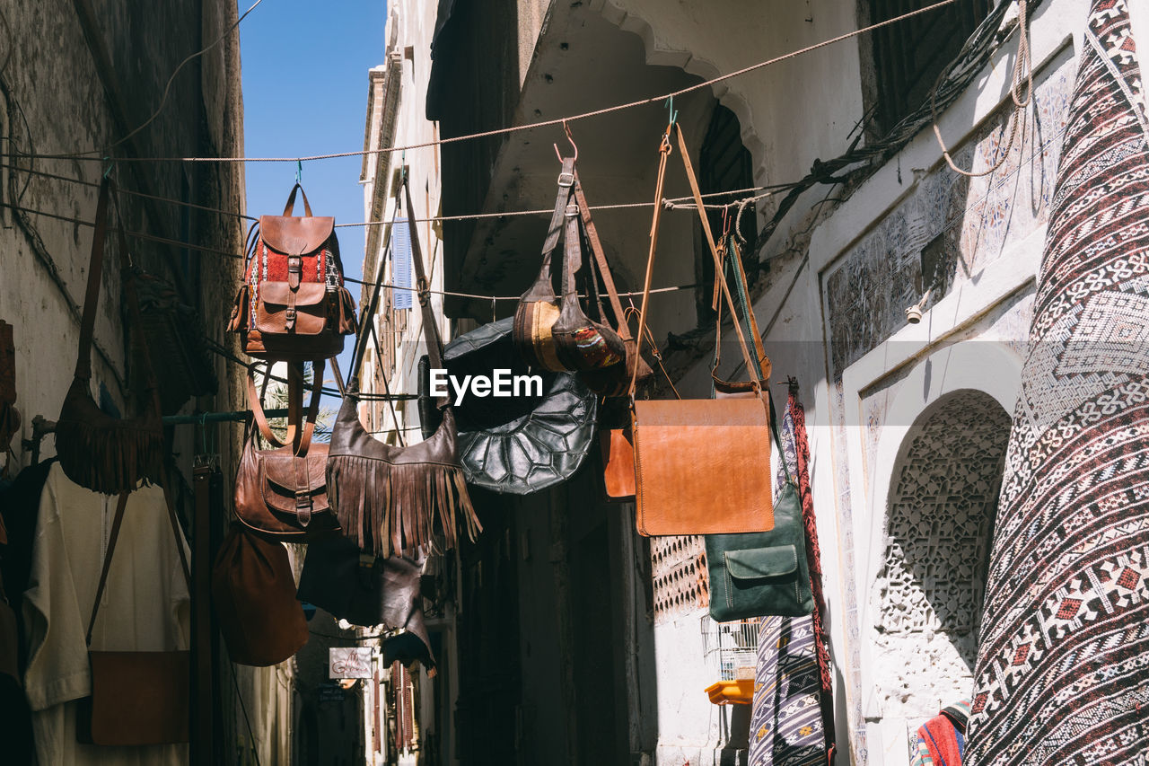 Colourful handcrafted leather bags of moroccan style, essaouira, morocco