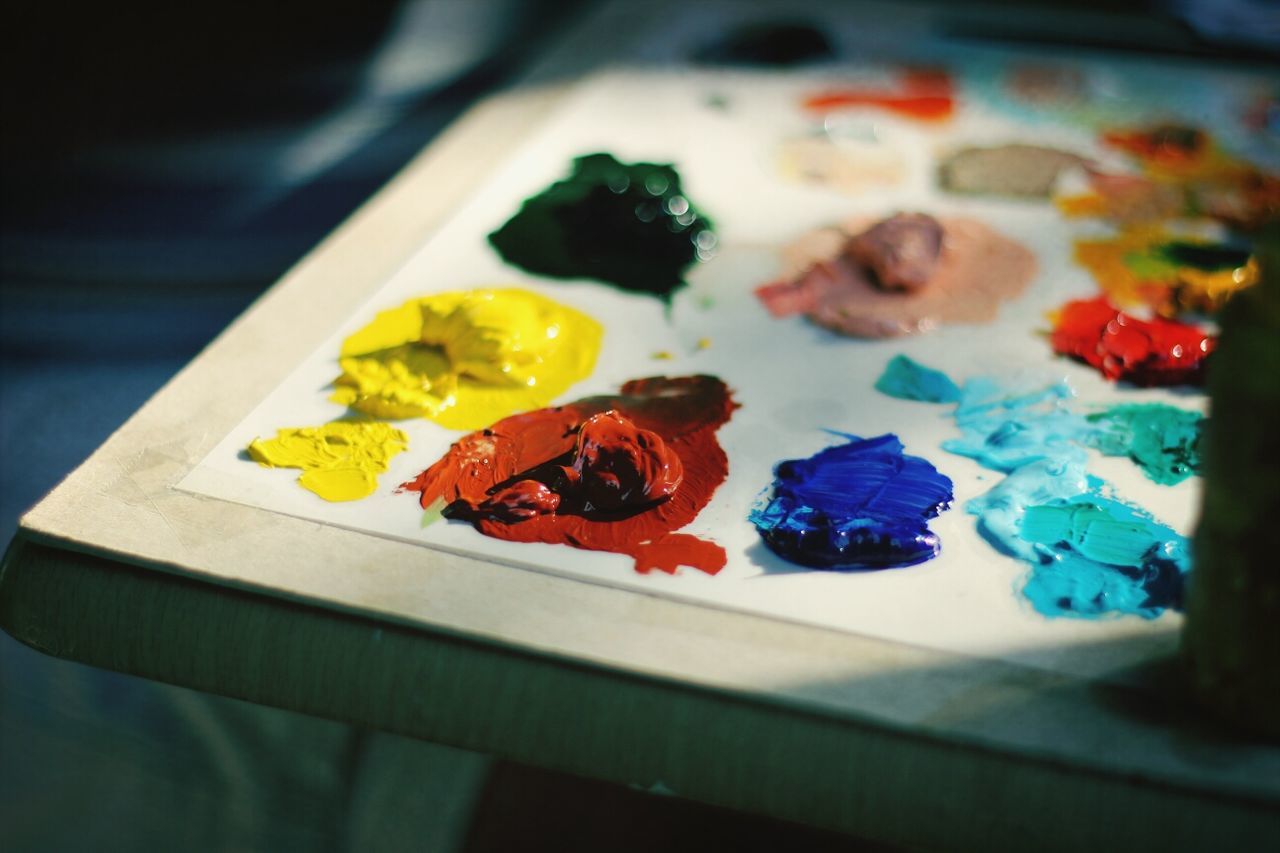 Close-up of color paints on palette