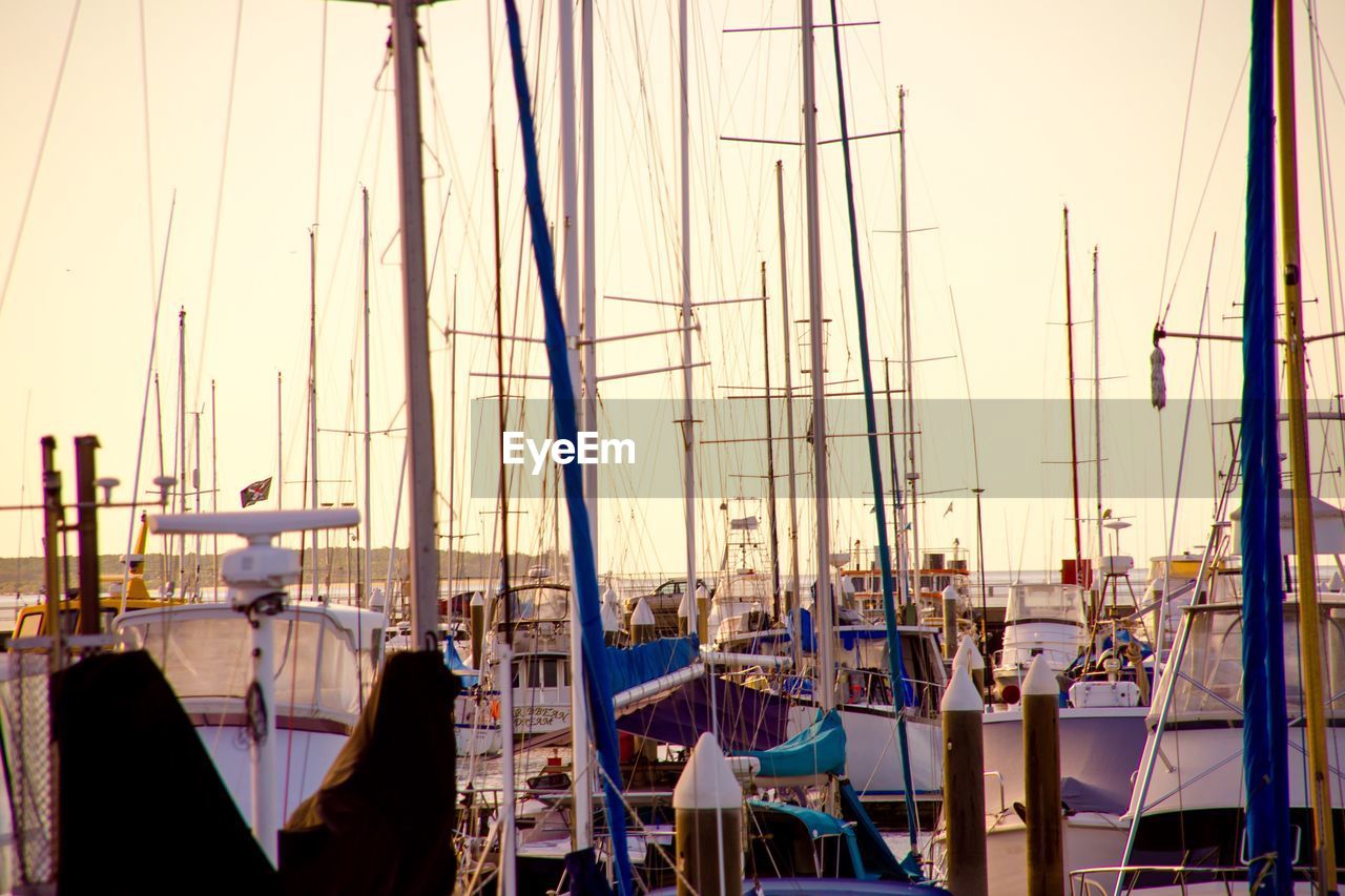 Boats moored at harbor