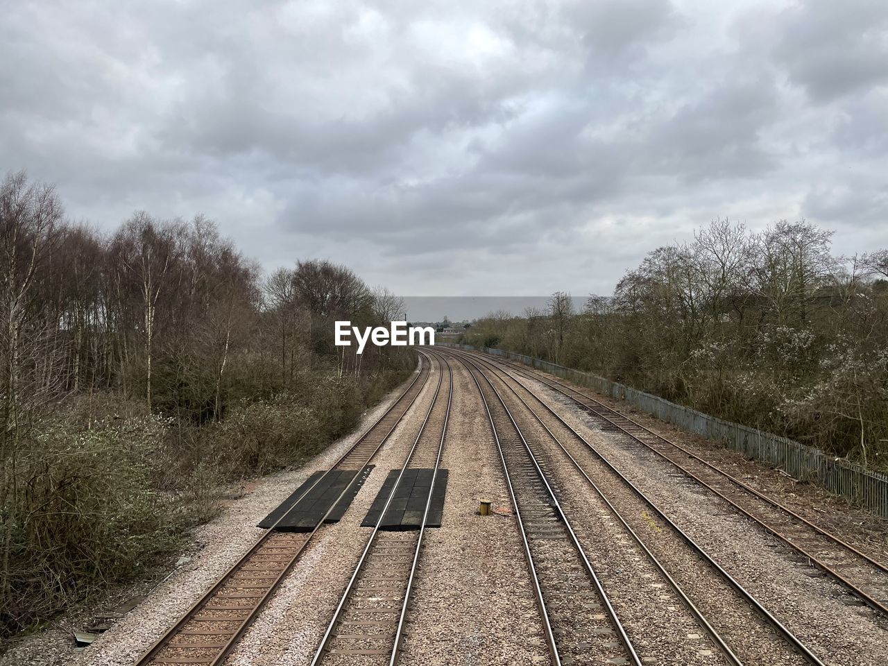 RAILROAD TRACKS AGAINST SKY