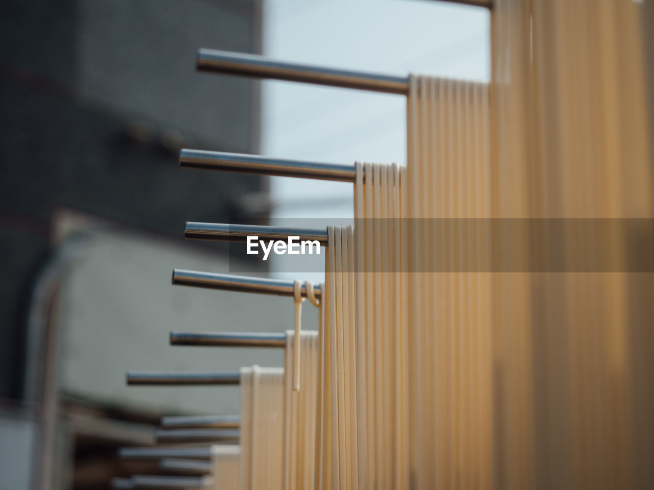 CLOSE-UP OF METAL RAILING ON BUILDING