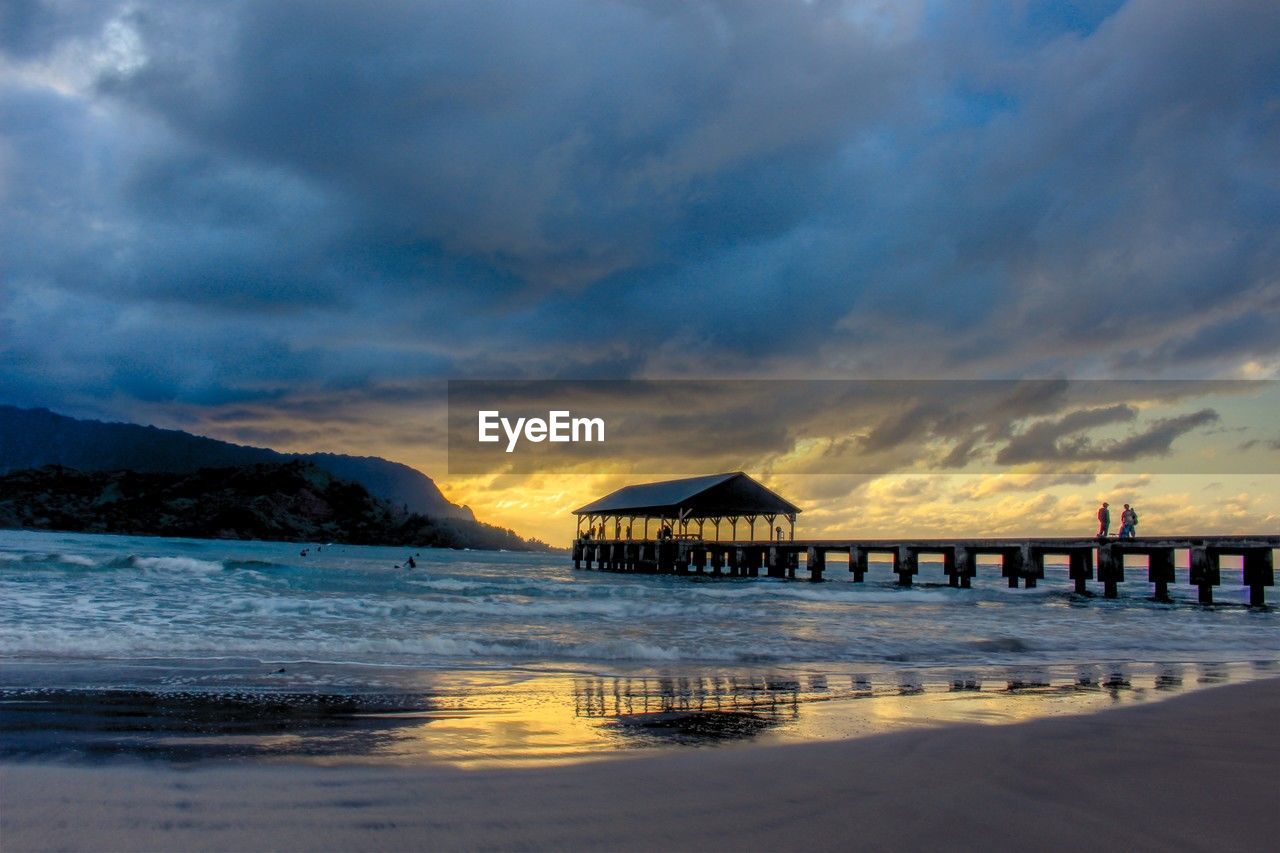 scenic view of sea against sky at sunset