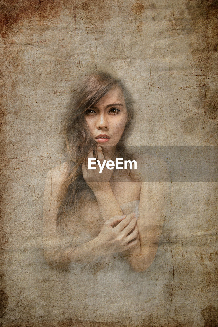 PORTRAIT OF A YOUNG WOMAN WITH FACE