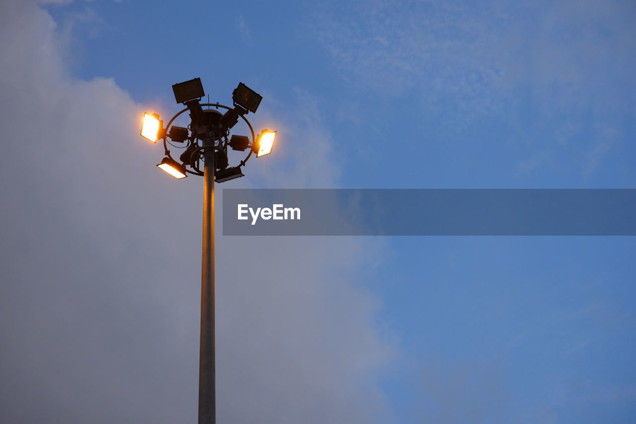 Low angle view of street light against sky