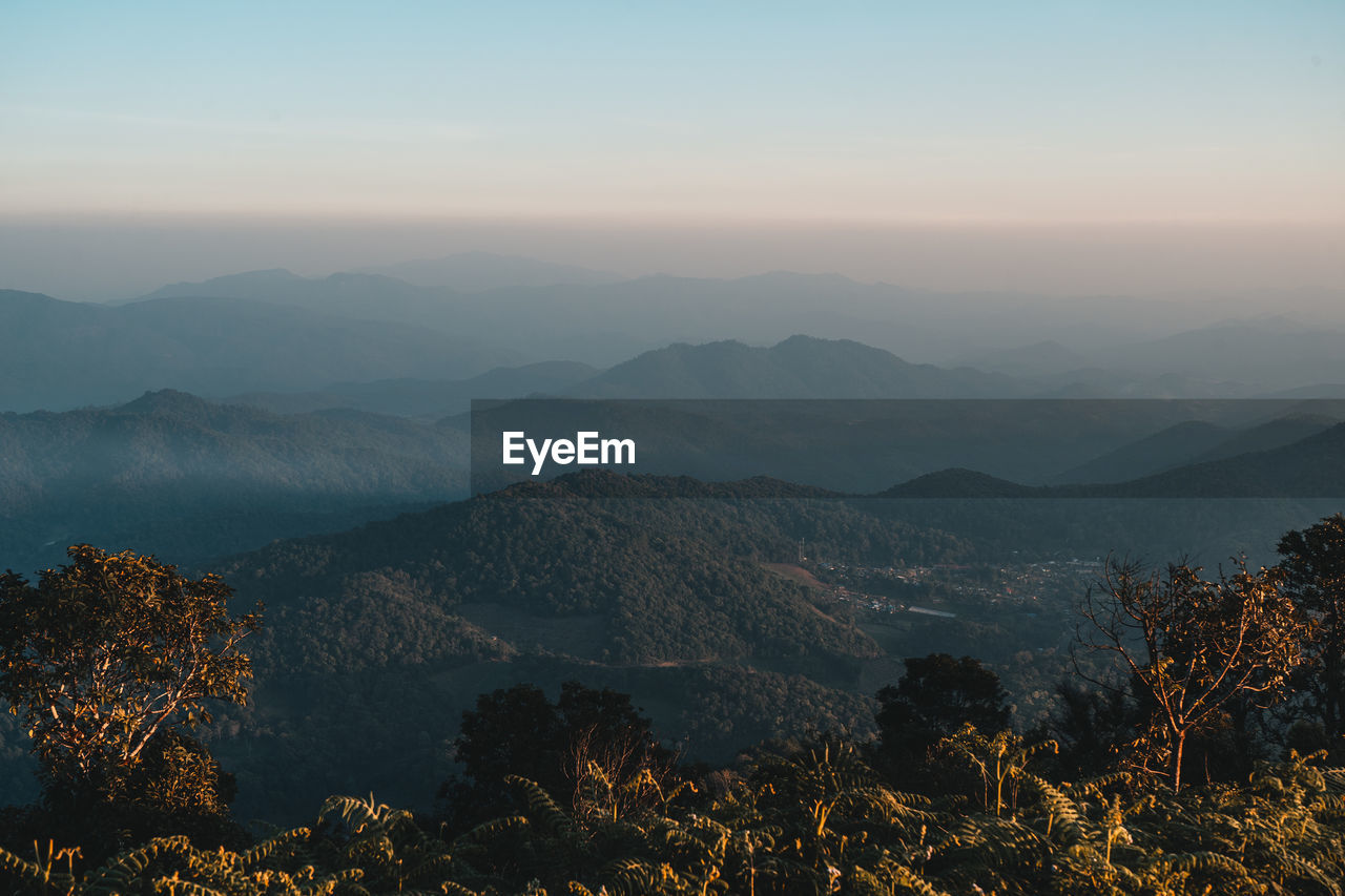 Scenic view of mountains against sky during sunset