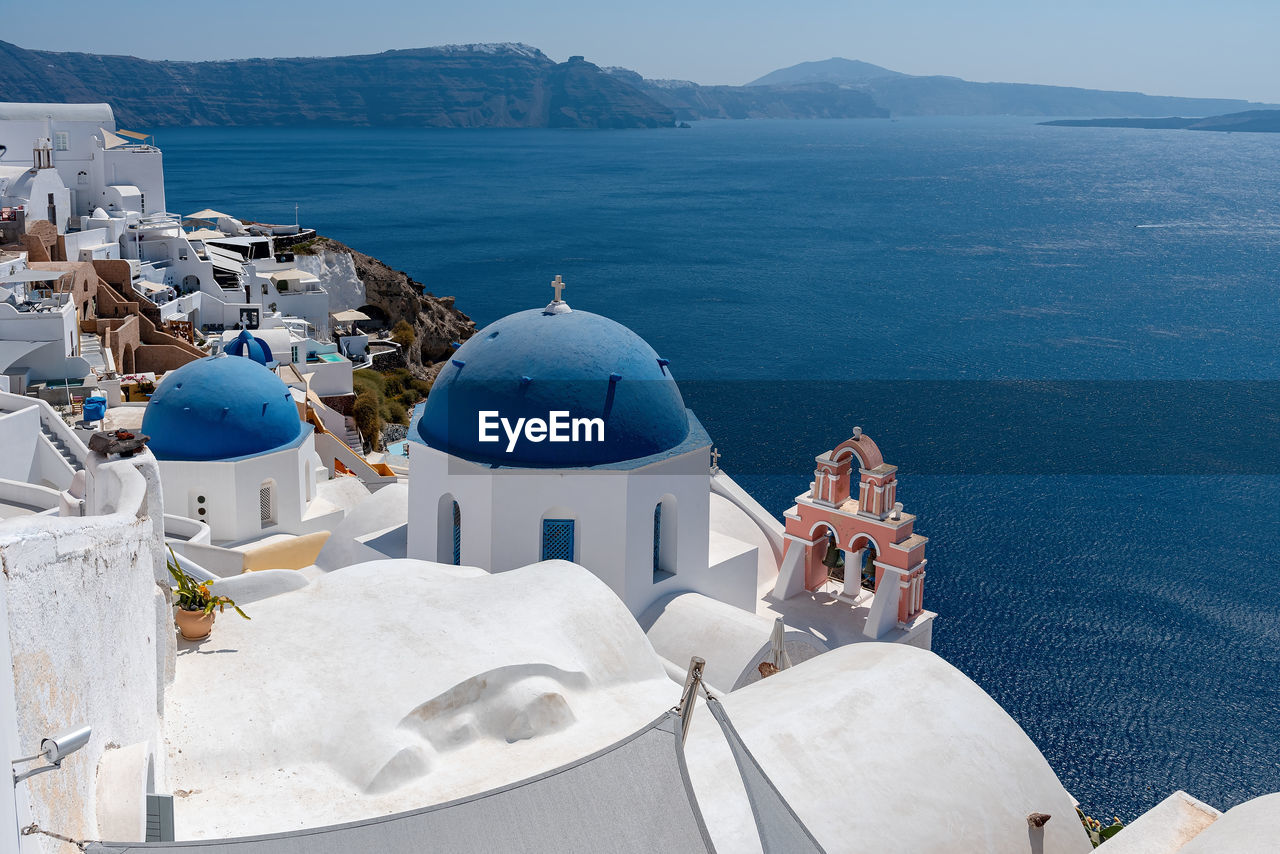 PANORAMIC VIEW OF SEA AND BUILDINGS