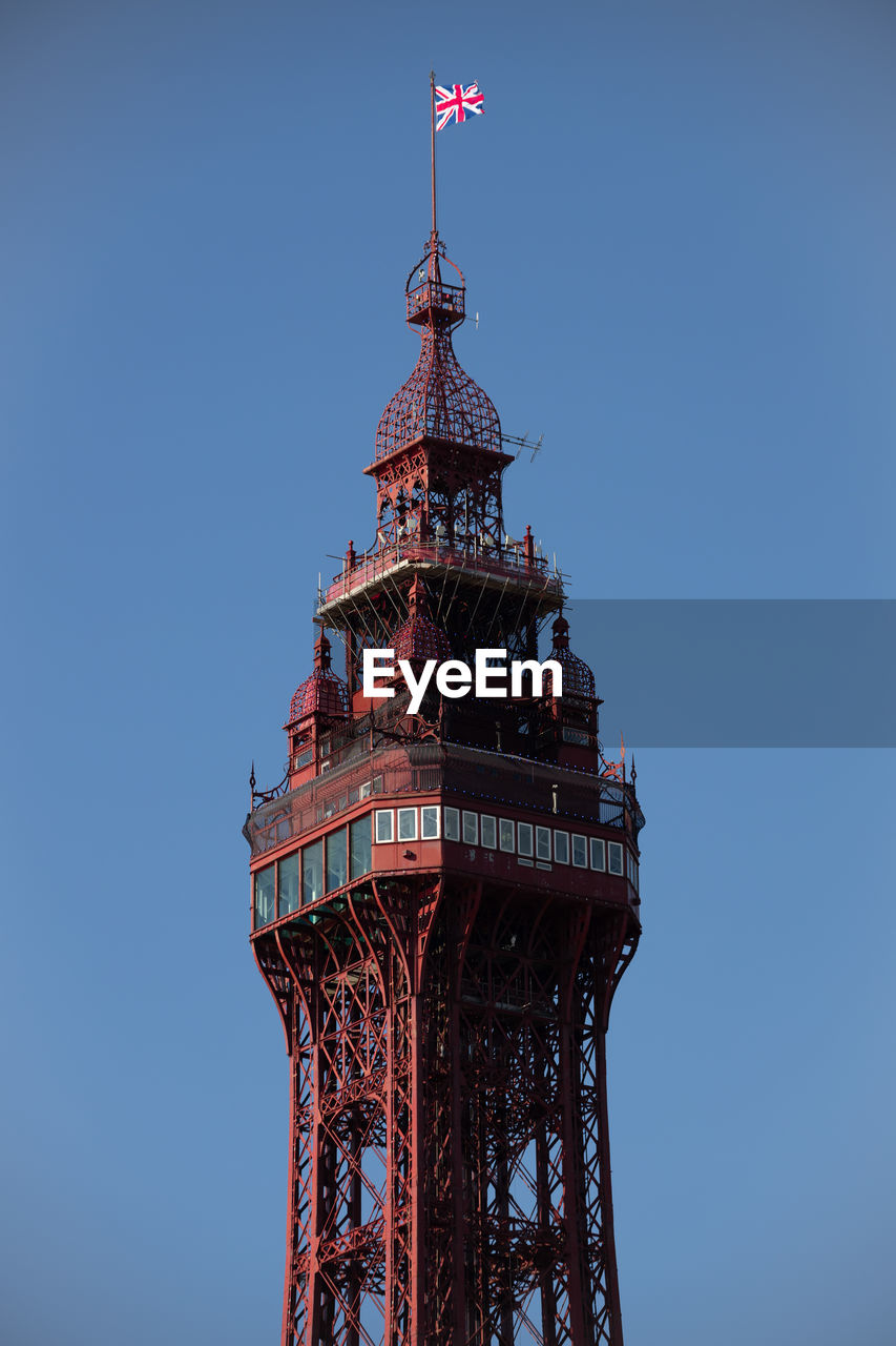 Close up of blackpool tower against a clear blue sky