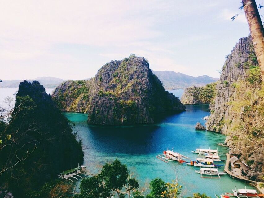 VIEW OF BOATS IN SEA