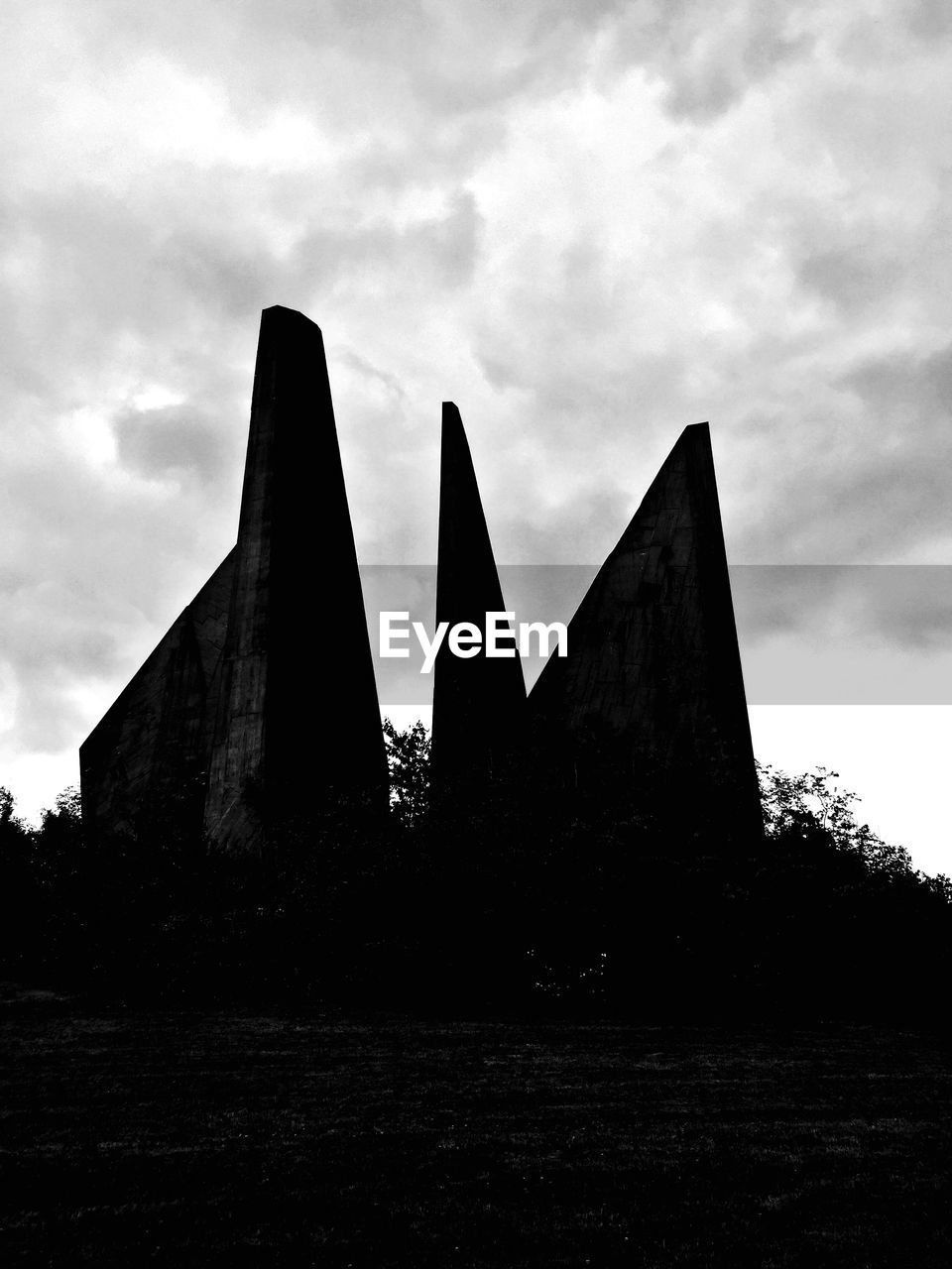 Silhouette historical friedland memorial against sky