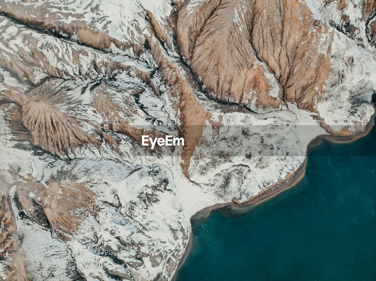 High angle view of frozen sea shore