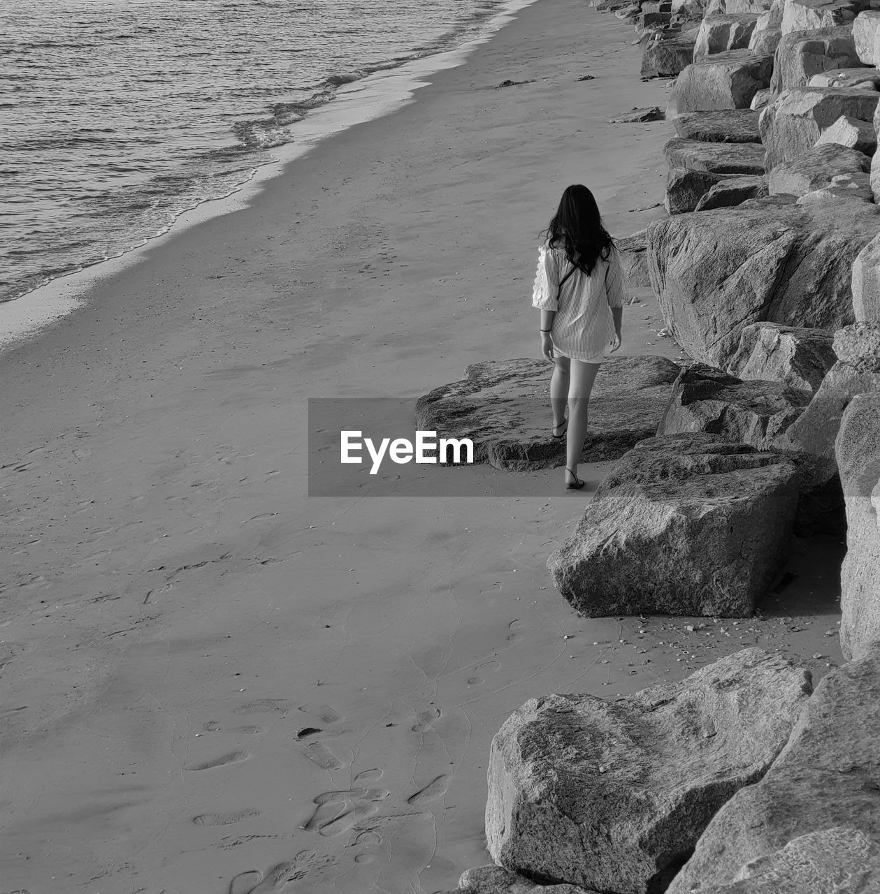 Woman walking at beach