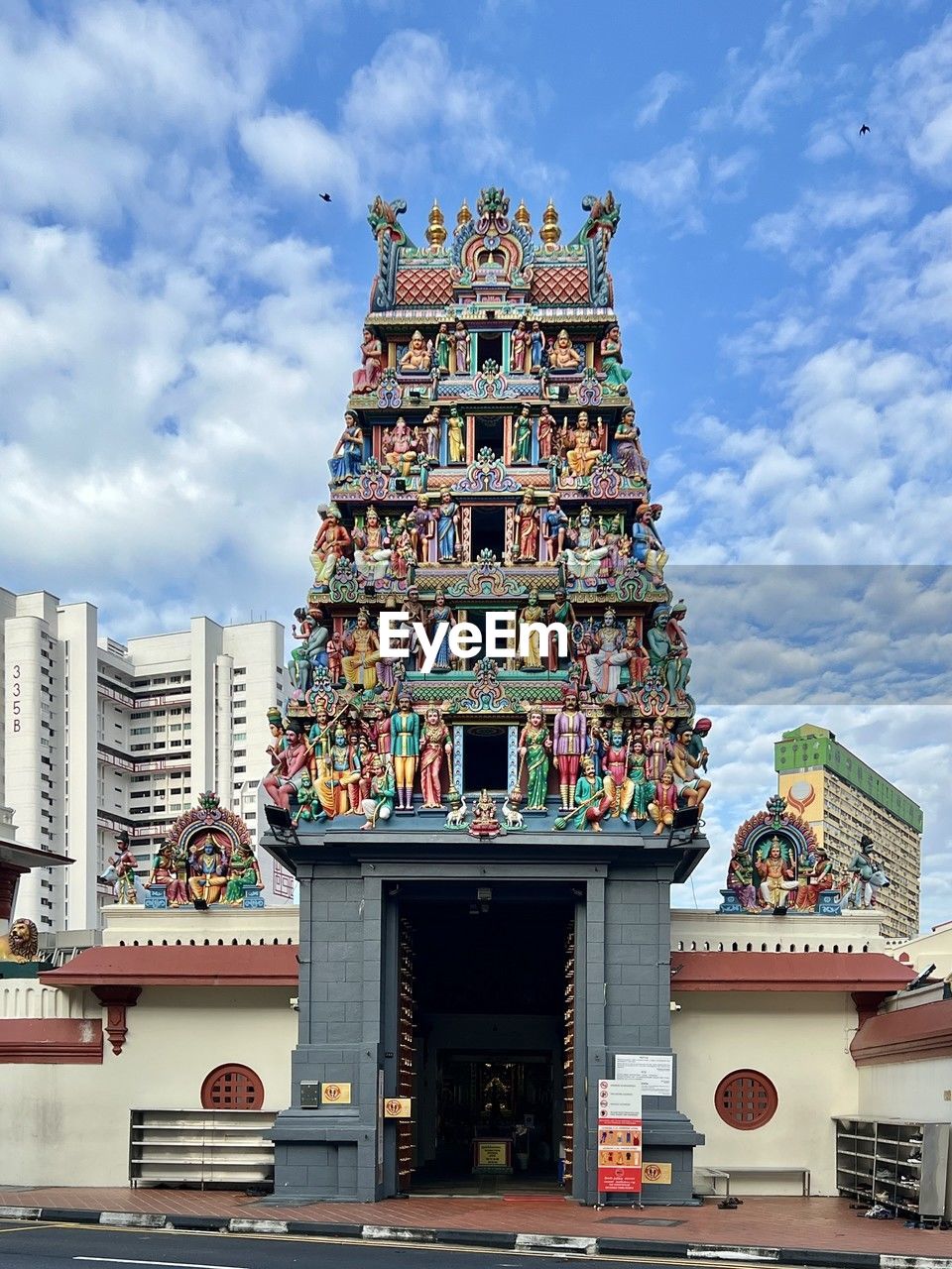 architecture, built structure, building exterior, landmark, sky, building, cloud, tower, travel destinations, city, temple, religion, temple - building, nature, belief, travel, history, no people, tradition, the past, outdoors, tourism, spirituality, place of worship, day, multi colored, low angle view