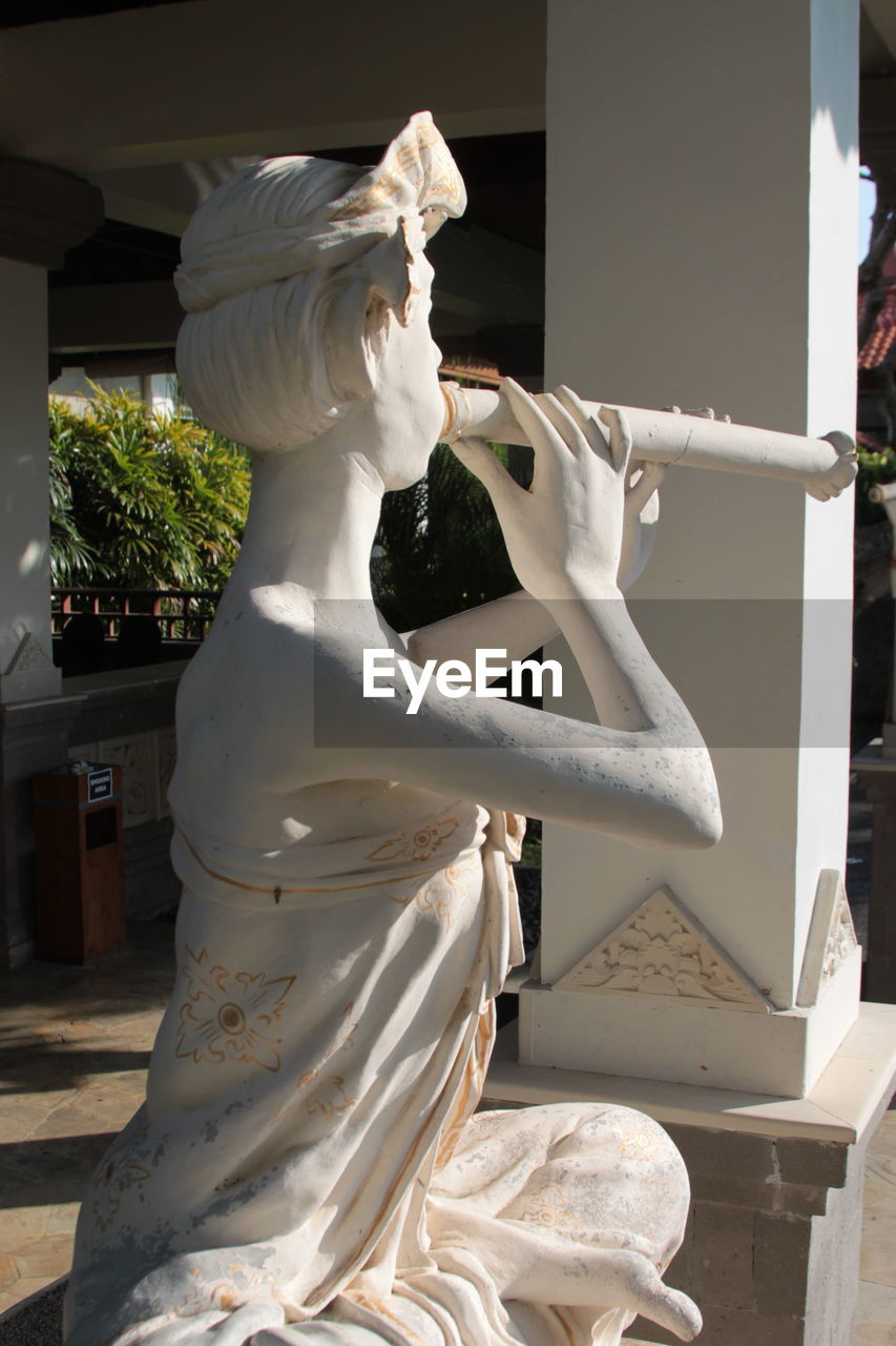 STATUE OF ANGEL OUTSIDE TEMPLE